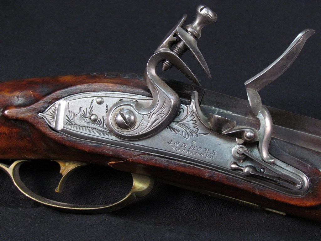 Detail of the lock and engraving on a Pennsylvania flintlock rifle
