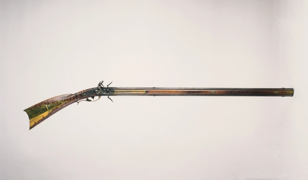 A swivel-barrel flintlock rifle shown in profile