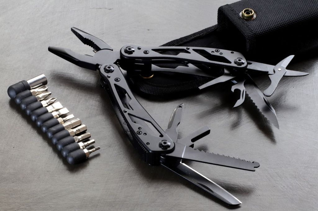 A folding multi-tool opened to show its pliers