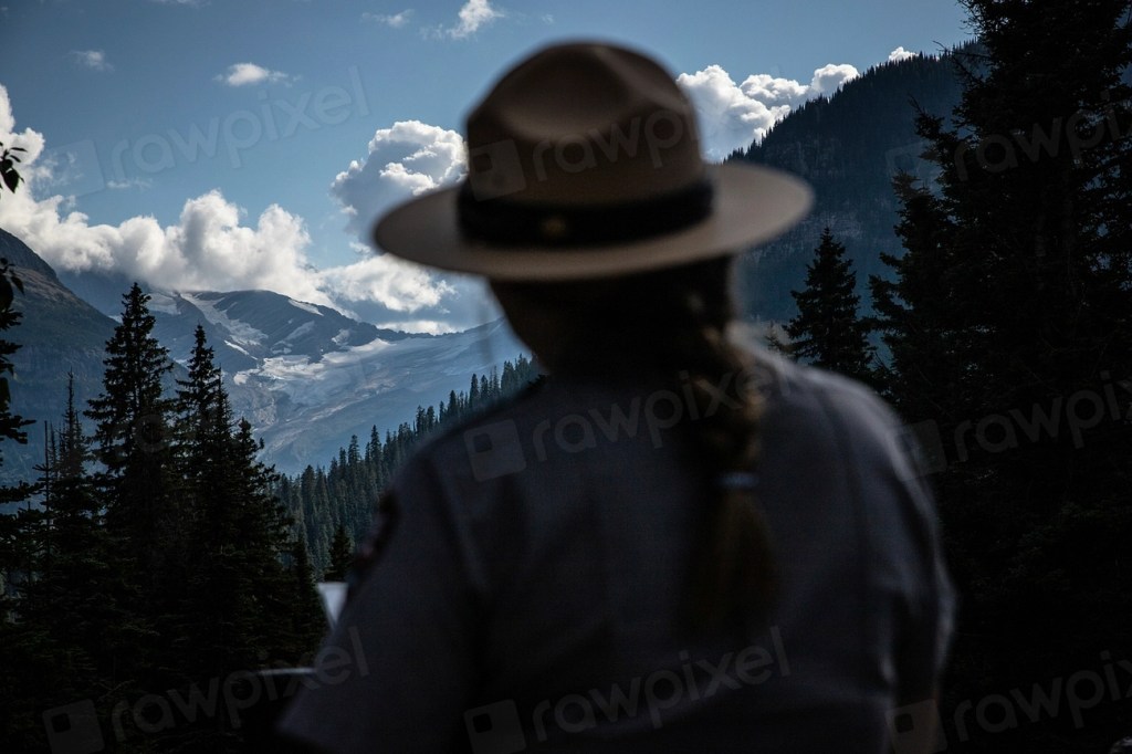 A park ranger speaking with visitors