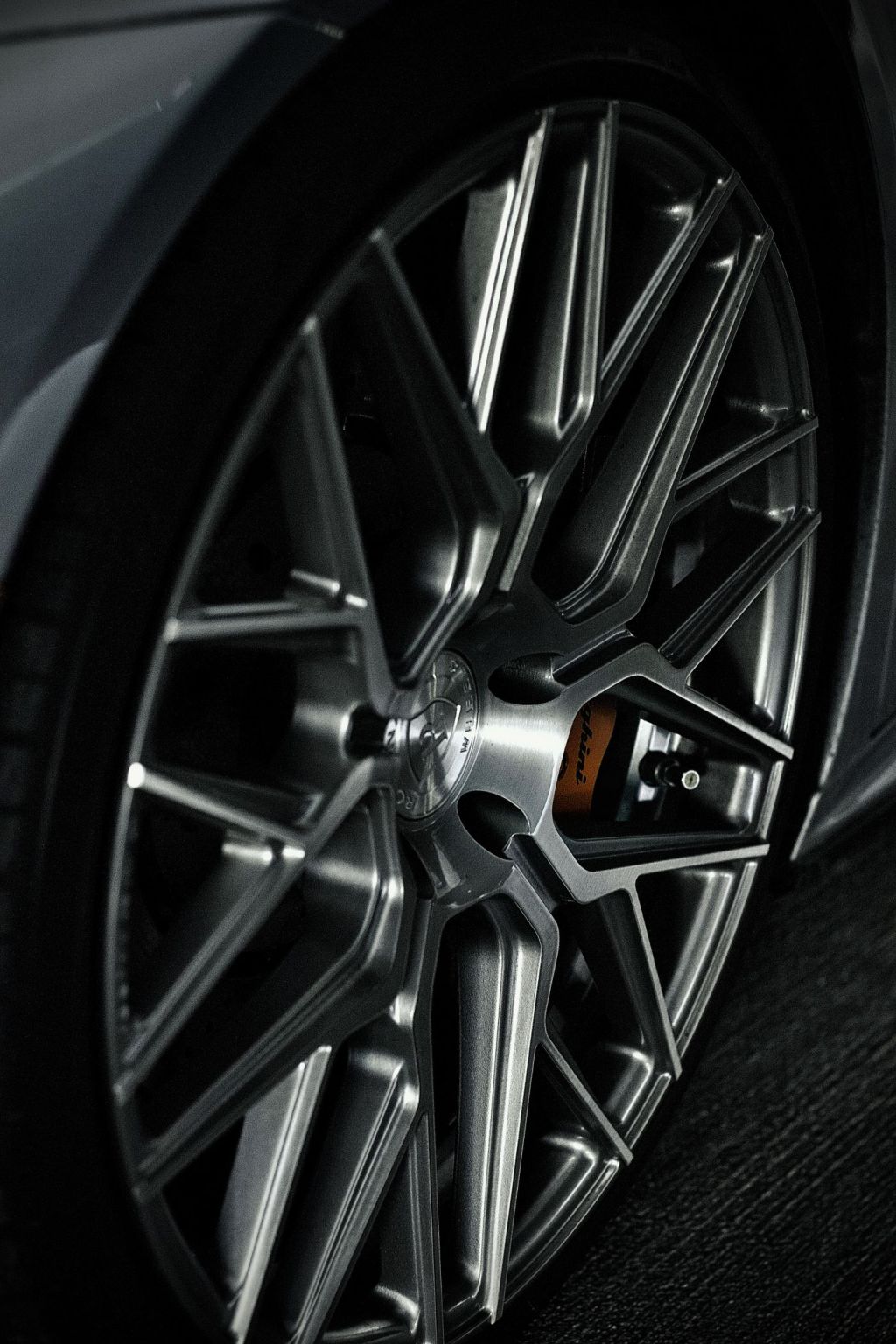 A close view of an alloy wheel and tyre